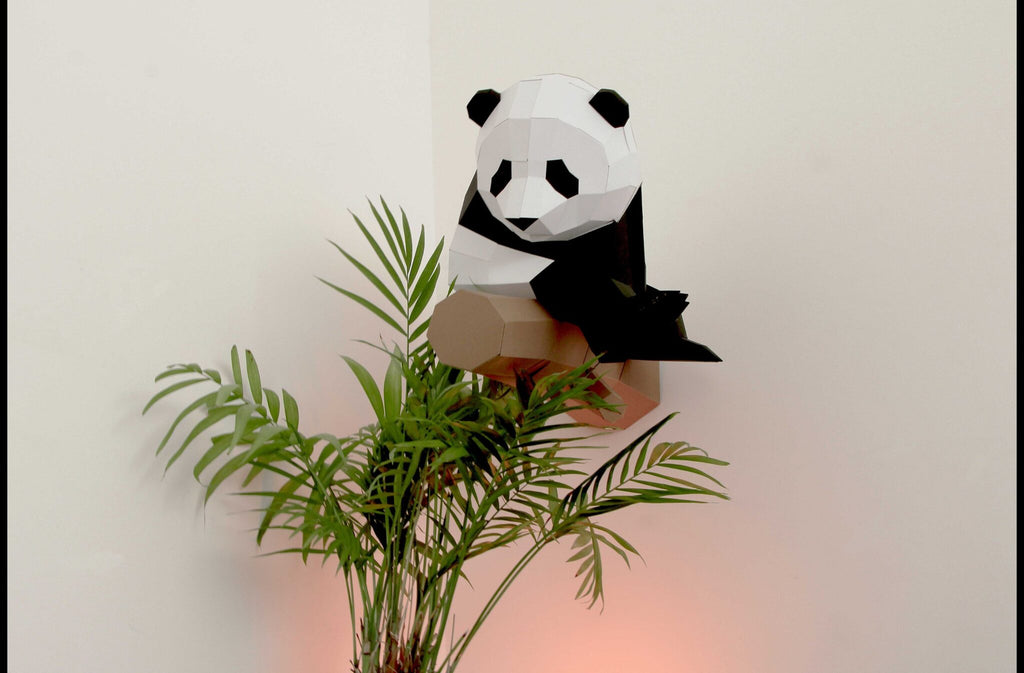 Petit panda sur branche en papier 3D