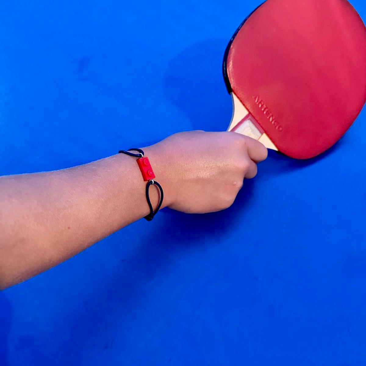 Bracelet d'amitié avec une brique Lego et cordon coton ajustable