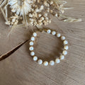 Bracelet with large mother-of-pearl beads & small gold beads