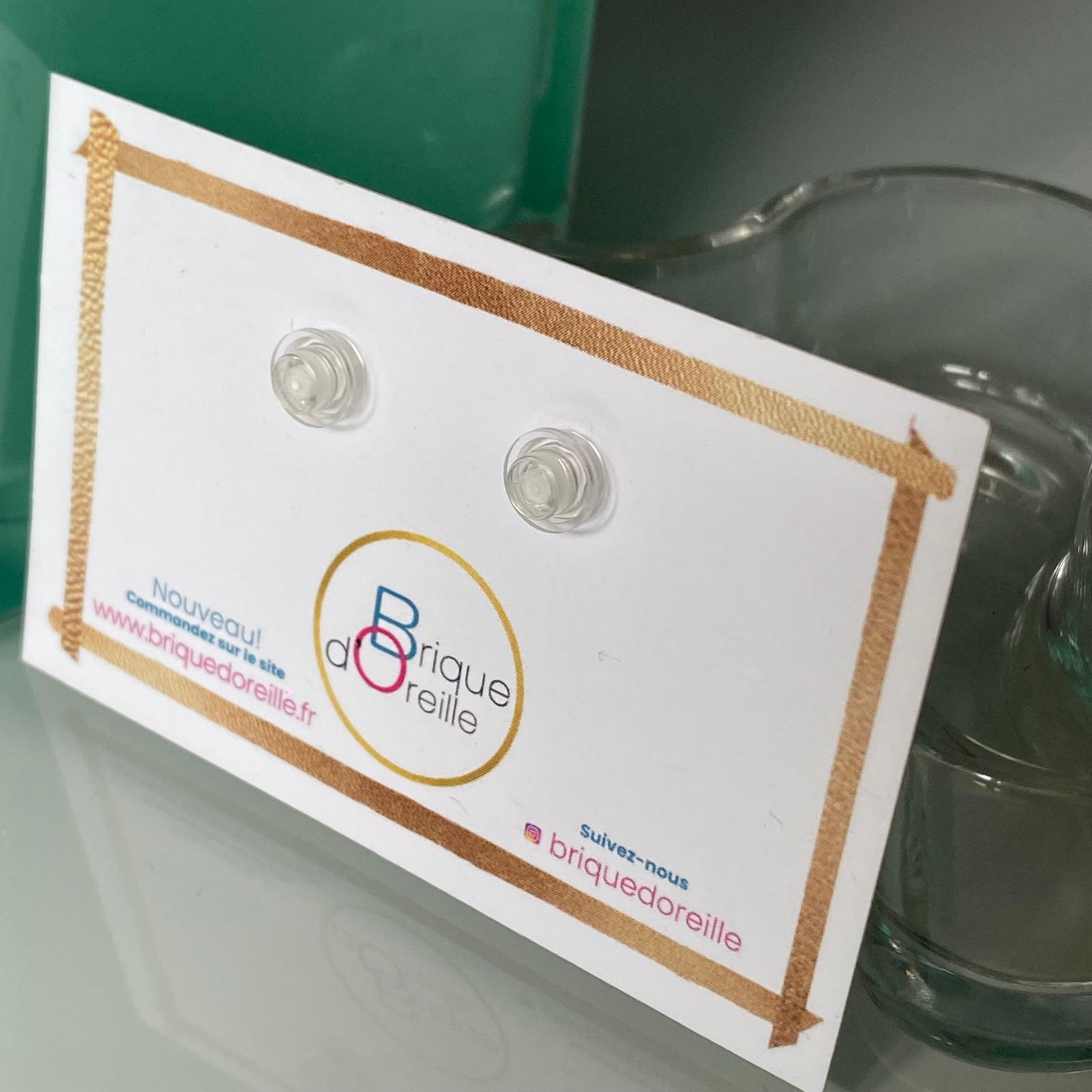Puces d'oreille avec une brique Lego ronde
