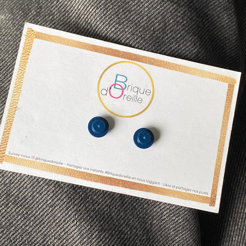 Puces d'oreille avec une brique Lego ronde