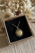 Collier soleil avec visage
